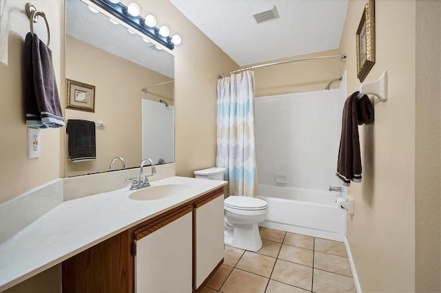 full bathroom featuring vanity, tile patterned floors, toilet, a textured ceiling, and shower / tub combo with curtain