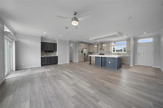 19196 Raymond Ave, Port Charlotte, FL 33954 - unfurnished living room with recessed lighting, ornamental molding, a ceiling fan, baseboards, and light wood finished floors