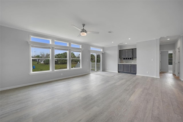19196 Raymond Ave, Port Charlotte, FL 33954 - unfurnished living room with ornamental molding, a ceiling fan, baseboards, light wood-type flooring, and recessed lighting