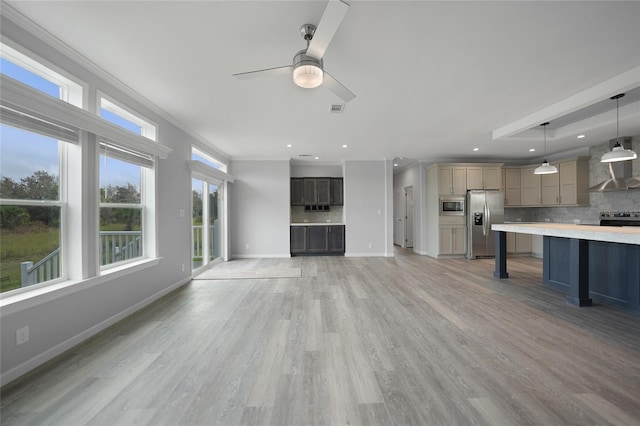 19196 Raymond Ave, Port Charlotte, FL 33954 - unfurnished living room featuring a ceiling fan, crown molding, baseboards, light wood finished floors, and recessed lighting