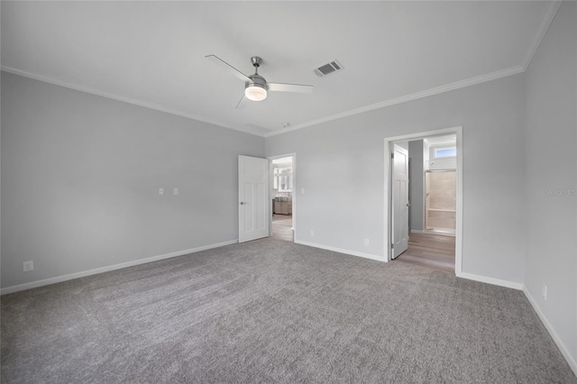 19196 Raymond Ave, Port Charlotte, FL 33954 - unfurnished bedroom with crown molding, carpet, baseboards, ensuite bath, and ceiling fan
