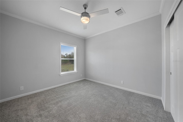 19196 Raymond Ave, Port Charlotte, FL 33954 - unfurnished bedroom with ornamental molding, carpet floors, baseboards, and a closet