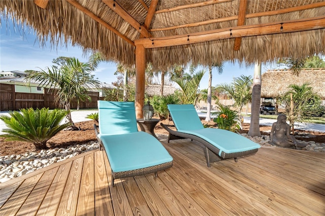 wooden terrace with a gazebo