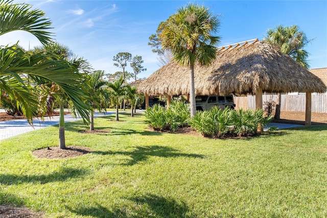 view of home's community with a gazebo and a lawn