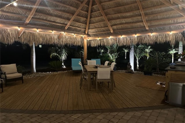 wooden terrace featuring a gazebo