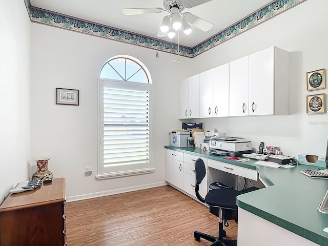 office space featuring light wood-type flooring and ceiling fan