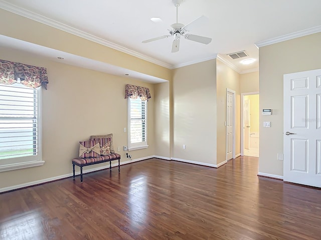 unfurnished room with ornamental molding, ceiling fan, and dark hardwood / wood-style flooring