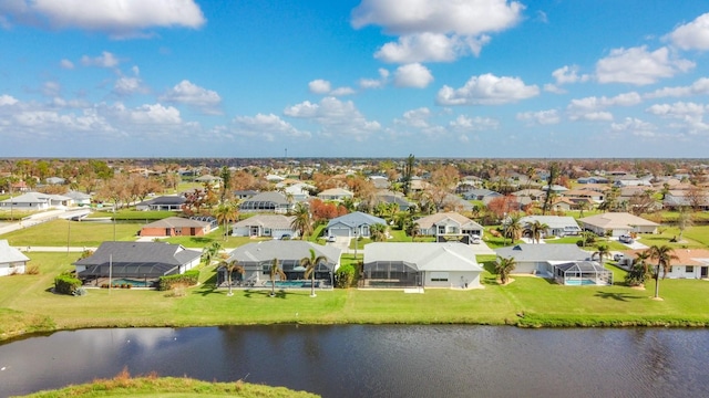 bird's eye view with a water view