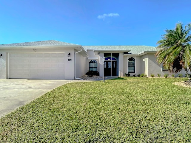 single story home featuring a front lawn and a garage