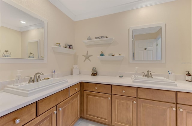 bathroom with vanity and ornamental molding