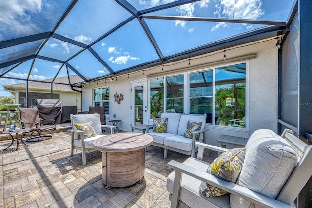 view of patio featuring a lanai and outdoor lounge area