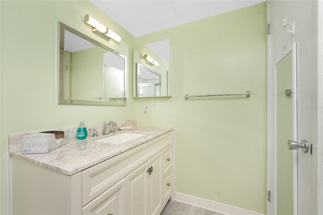 bathroom featuring vanity and tile patterned floors