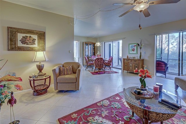 tiled living room with ceiling fan