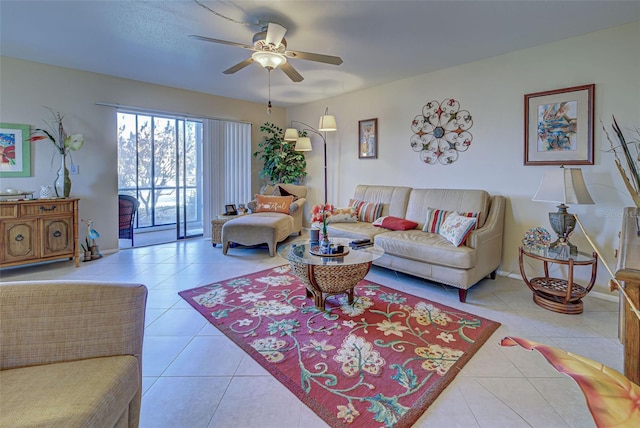 tiled living room featuring ceiling fan