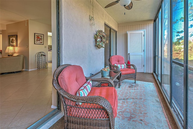 sunroom / solarium with ceiling fan