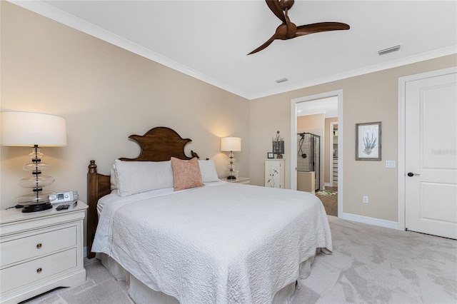 bedroom with ornamental molding, ensuite bathroom, light colored carpet, and ceiling fan