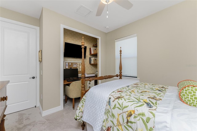 bedroom with ceiling fan and light carpet