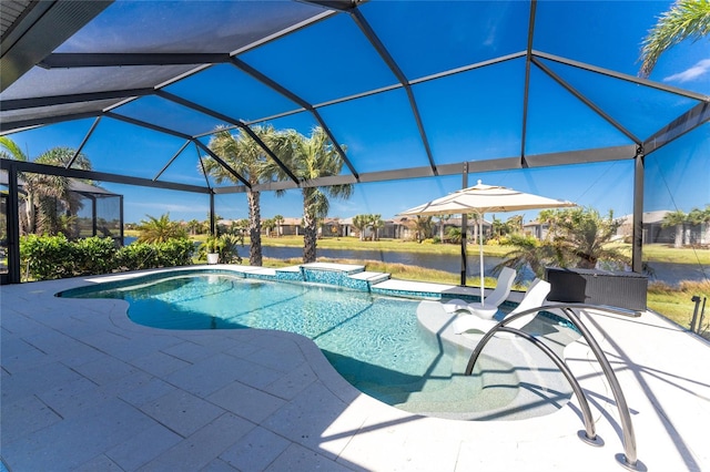 view of pool with a patio, a lanai, and a water view