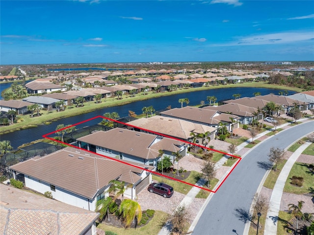 drone / aerial view featuring a water view