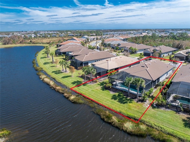 13077 Rinella St, Venice, FL 34293 - aerial view of residential area with property parcel outlined and a large body of water