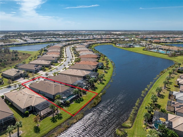 drone / aerial view featuring a water view