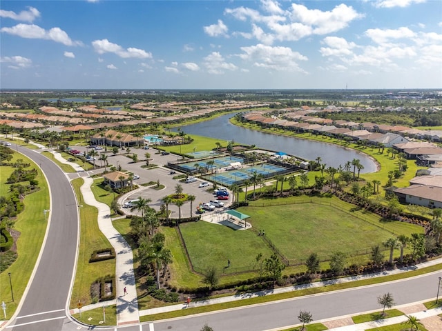 bird's eye view with a water view