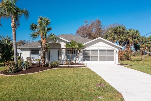 ranch-style house with a front yard and a garage