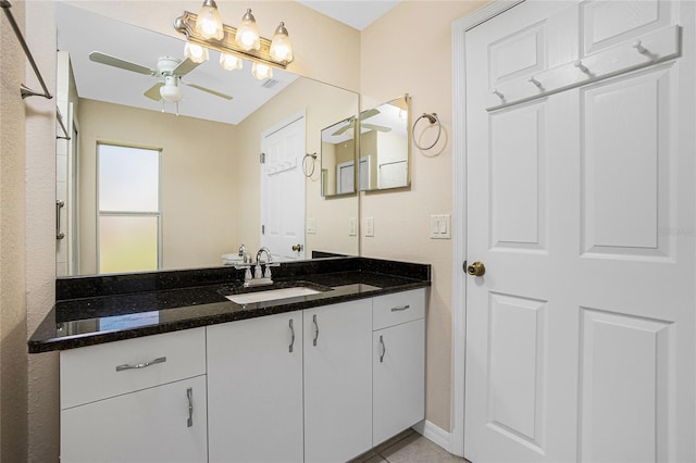 bathroom featuring vanity and ceiling fan