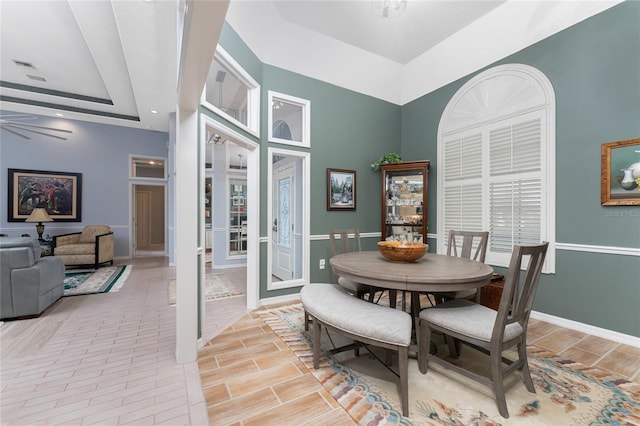 dining area featuring light hardwood / wood-style floors and ceiling fan