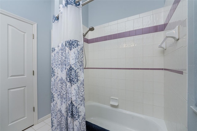 bathroom featuring tile patterned flooring and shower / bath combo