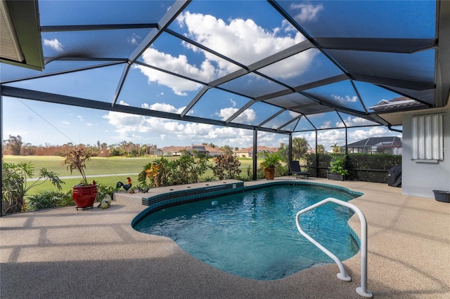 view of pool featuring a patio and a lanai