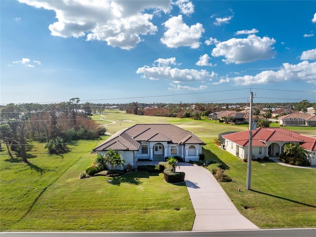 view of front of home with a front yard