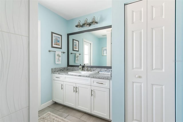 bathroom featuring vanity and tile patterned flooring