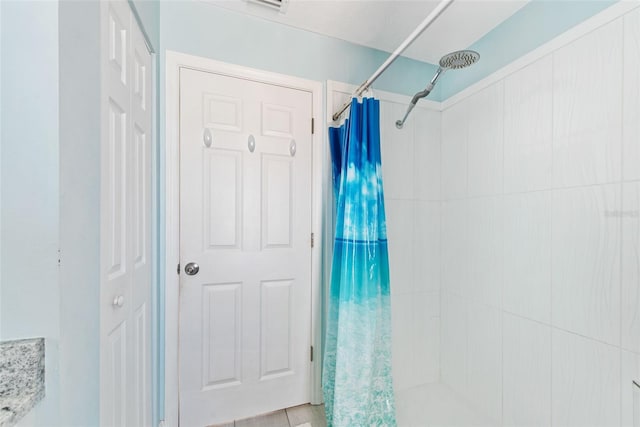 bathroom featuring curtained shower