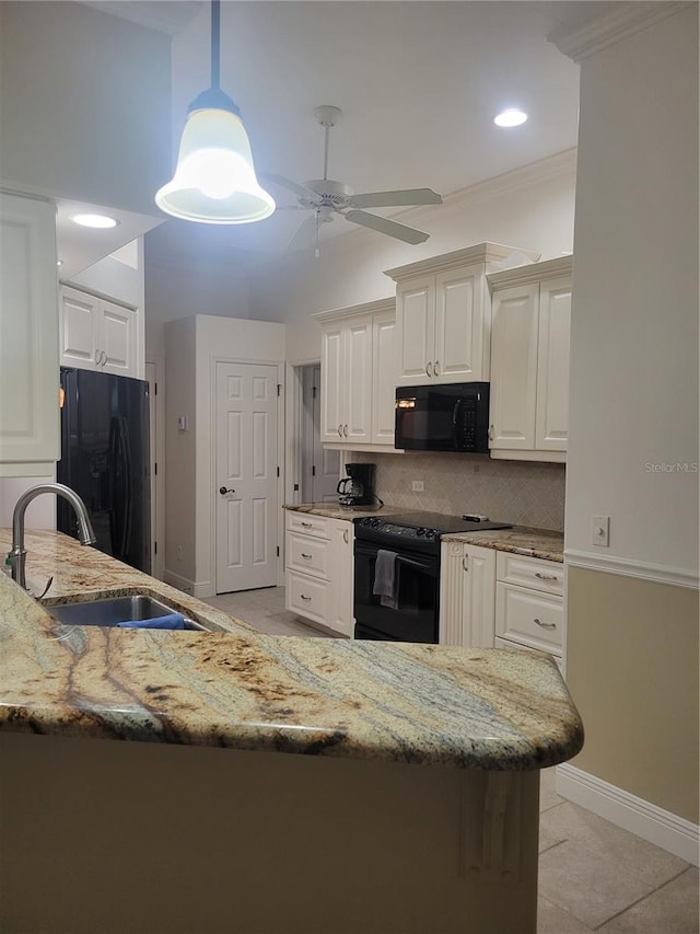 kitchen featuring kitchen peninsula, ceiling fan, sink, black appliances, and light tile patterned flooring