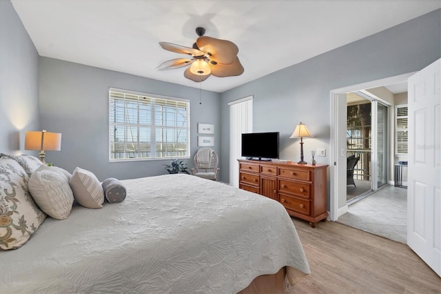 bedroom with access to exterior, ceiling fan, and light hardwood / wood-style flooring