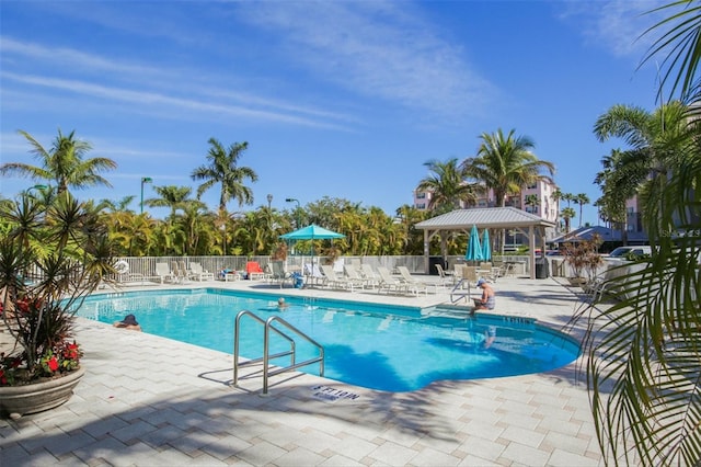 view of swimming pool with a patio area