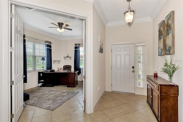 foyer with light tile patterned floors, crown molding, and ceiling fan