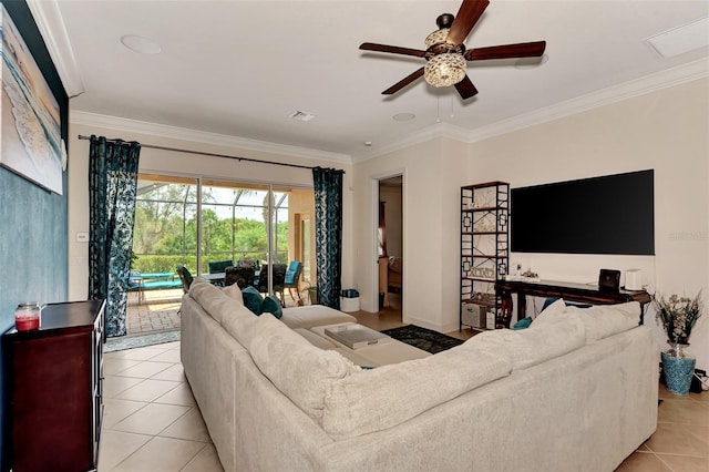 living area with visible vents, light tile patterned floors, a ceiling fan, and ornamental molding