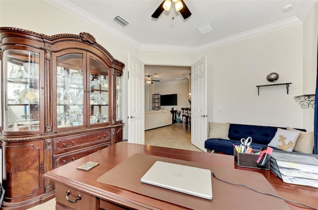 tiled office featuring ceiling fan and ornamental molding