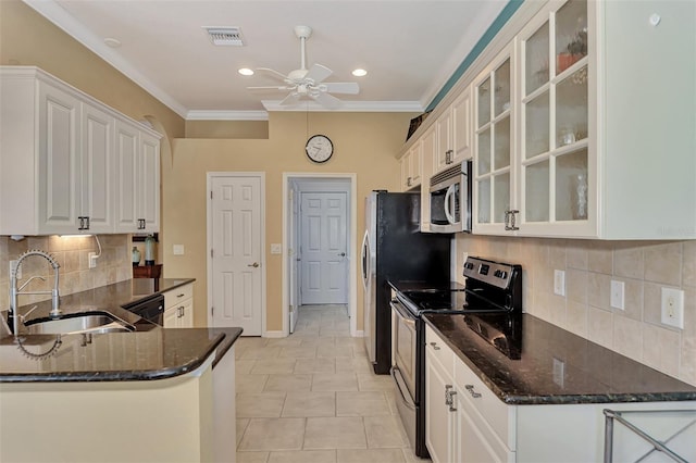 kitchen with crown molding, stainless steel appliances, white cabinetry, light tile patterned floors, and sink