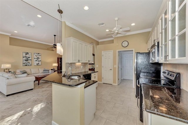 kitchen featuring white cabinetry, sink, black appliances, tasteful backsplash, and crown molding