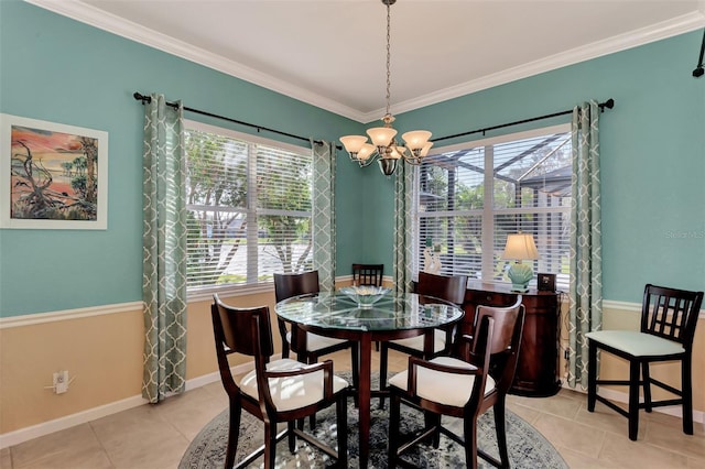 dining space with light tile patterned floors, crown molding, and an inviting chandelier