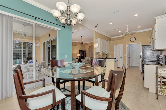 tiled dining area with a notable chandelier and ornamental molding