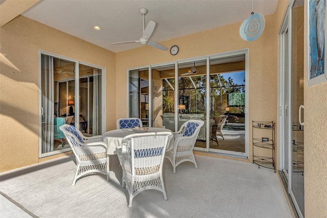 sunroom / solarium with ceiling fan