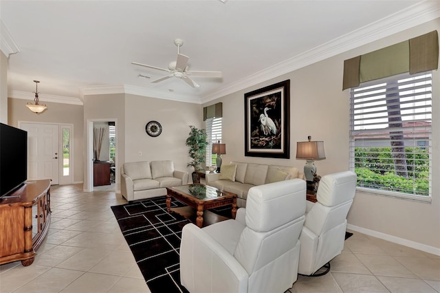 living room with ornamental molding, light tile patterned flooring, and ceiling fan