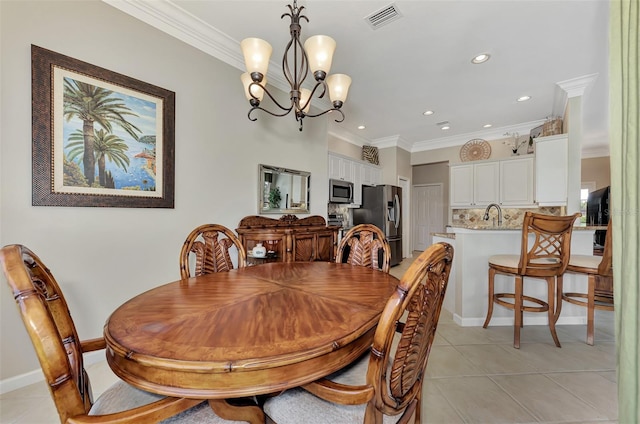 tiled dining space featuring sink, an inviting chandelier, and crown molding