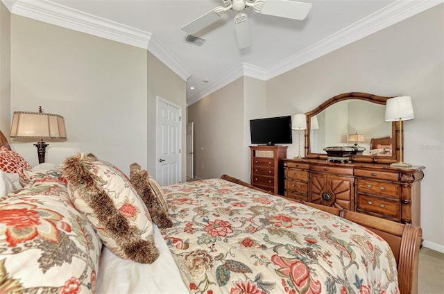 carpeted bedroom featuring ceiling fan and crown molding