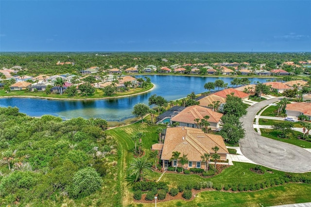 drone / aerial view with a water view