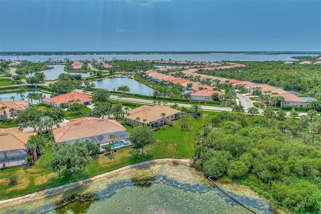 drone / aerial view with a water view